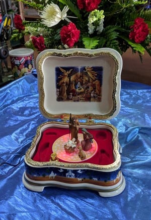 Rodney Gore of Tabor City says this is his latest music box nativity, which he bought at a Cracker Barrel in Myrtle Beach, South Carolina. The florist owns nearly 2,100 nativity scenes which he displays at an expo in Tabor City. [Contributed photo]