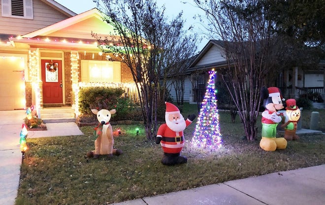 AJ Firenze said he and his son spent several hours placing holiday decorations in their front yard. The next morning, he said, "everything not attached to the house was stolen." [Courtesy photo]