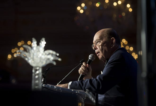 Secretary of Commerce and Palm Beach resident Wilbur Ross accepts the Palm Tree Award during the Palm Beach Police Foundation's annual ball at The Mar-a-Lago Club earlier this year. Among her other duties, new foundation executive director Lisa Loomis will oversee this year's event. [Meghan McCarthy/palmbeachdailynews.com file photo]