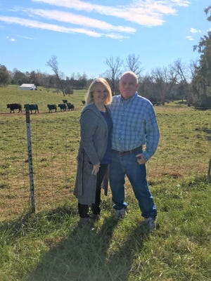 Diane and Dee Mintz at their family farm near Polkville. The family received an award for their conservation efforts. [Special to The Star]