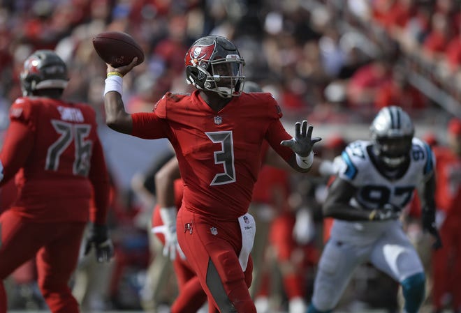 Tampa Bay Buccaneers quarterback Jameis Winston (3) throws a pass against the Carolina Panthers during the first half Sunday in Tampa. Winston threw for 249 yards and two touchdowns in the Bucs' 24-17 win over the Panthers. [The Associated Press / Jason Behnken]
