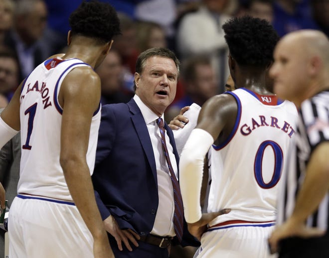 Kansas coach Bill Self, middle, said his team's 3-point shooting and its 3-point defense have developed into "a concern both ways." The No. 2-ranked Jayhawks host sharp-shooting Wofford at 7 p.m. Tuesday at Allen Fieldhouse in Lawrence. [Orlin Wagner/The Associated Press]