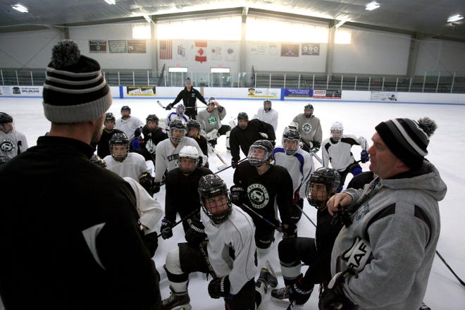 Plymouth South Head Coach Mike McCosh talks to his team during a practice last week. [Wicked Local Staff Photo/Alyssa Stone]