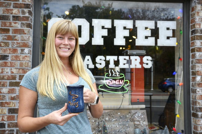 Sydney Sailors said the homey feeling of Maas Coffee Roasters in downtown Fort Walton Beach is what first attracted her to the coffee shop. [SAVANNAH VASQUEZ/DAILY NEWS]