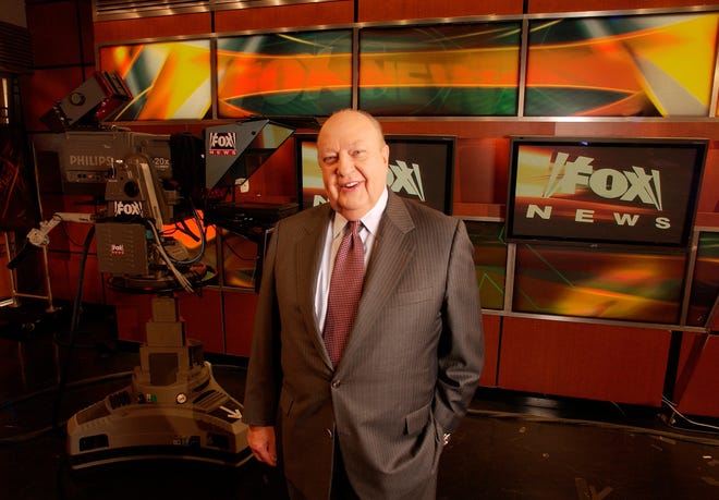 In this Sept. 29, 2006 file photo, Fox News CEO Roger Ailes poses at Fox News in New York. A new documentary, “Divide and Conquer: The Roger Ailes Story,” directed by Alexis Bloom, deconstructs the rise and fall of the late head of Fox News Channel. [Jim Cooper]
