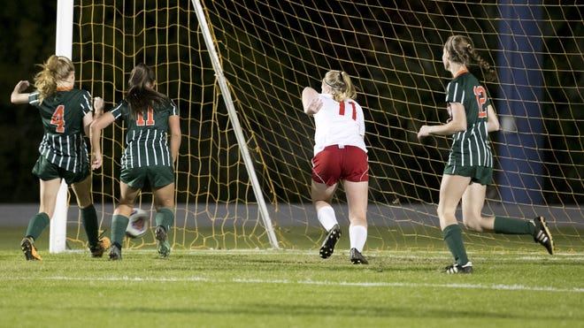 Mosley's Jamie Kaltenpoth (4) scores a goal against Bay in the first half of Tuesday's game at Arnold High School. [JOSHUA BOUCHER/THE NEWS HERALD]