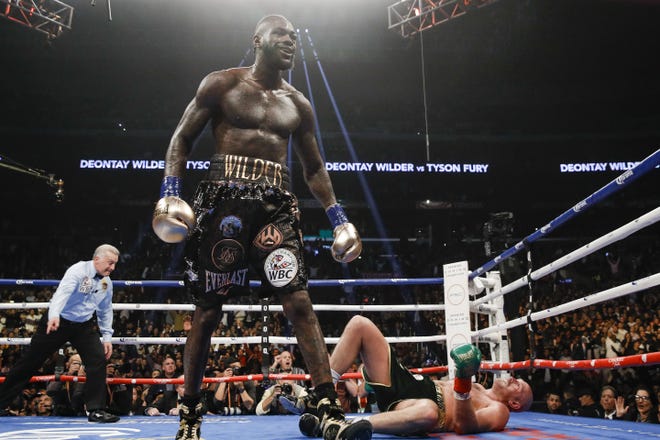 Deontay Wilder knocked Tyson Fury down twice in the 12-round WBC heavyweight bout Saturday, Dec. 1, 2018. It ended with a split decision, with Wilder retaining the championship. [Photo Credit: Esther Lin/SHOWTIME Sports]