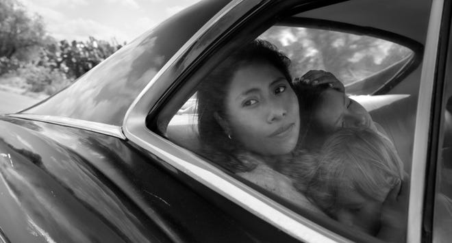 This image shows a scene from the film "Roma," by filmmaker Alfonso Cuaron. [Netflix]