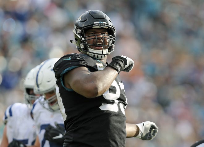 Jacksonville defensive end Calais Campbell knows the Jaguars must contain Tennessee quarterback Marcus Mariota. [Gary McCullough/The Associated Press]