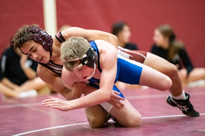 Buhler's Martean Perez defeats Circle's David Davis by pin in the wrestling meet at Buhler, Thursday, Dec. 6, 2018. Buhler defeated Circle 56-24. [Jesse Brothers/HutchNews]