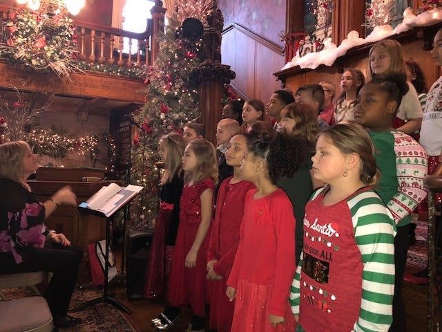 Music Director Julie Dewald leads the 16th Street Singers, third-graders at Franklin Elementary School, as they perform at the Massillon Woman's Club.

(Photo provided)