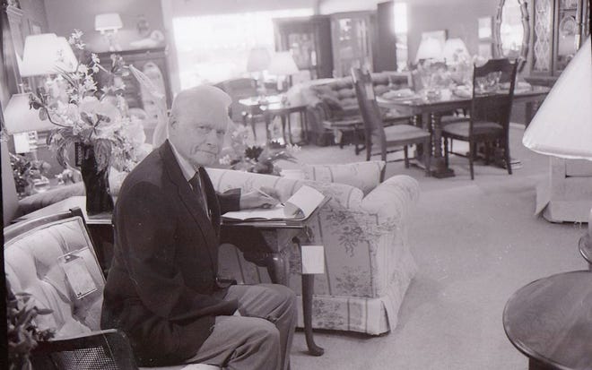 Don Klavohn pauses in the showroom of Klavohn Furniture Store in this 1988 picture. The longtime Geneseo businessman and community supporter died 
Monday, Nov. 26.