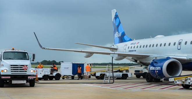 In this 2015 file photo, JetBlue plane is refueled at the Sarasota-Bradenton International Airport. The airline is having a sale in an effort to promote tourism in Florida. [HERALD-TRIBUNE FILE PHOTO / DAN WAGNER]