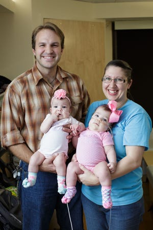 Andre Pitre and his wife, Angi Pitre, and babies Jesi and Remi [UF Health]