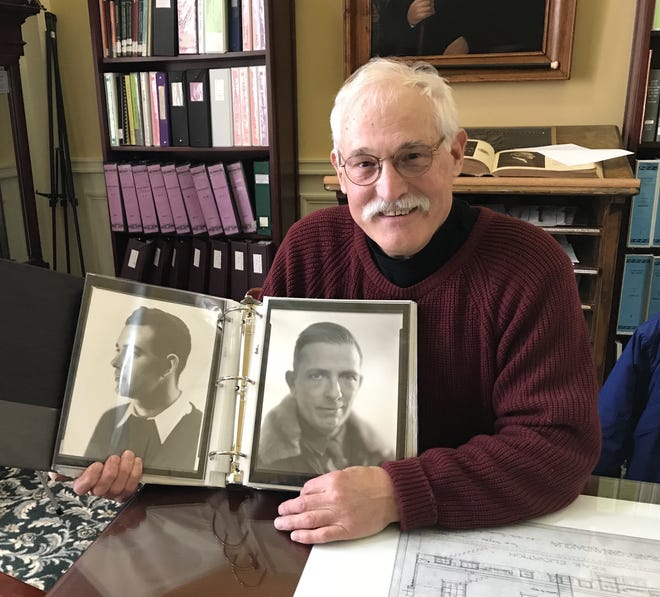 Ed Varno, executive director of the Ontario County Historical Society, shows two unnamed portraits from the studio of famed photographers Peggy and Helen Stewart. The community is being asked to help put names to the faces pictured.

[MIKE MURPHY/MESSENGER POST MEDIA]