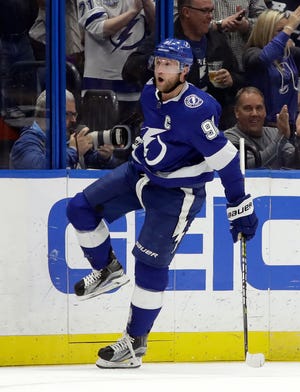 Lightning center Steven Stamkos celebrates his goal against the Avalanche during Saturday night's NHL game at Amalie Arena in Tampa. [THE ASSOCIATED PRESS / CHRIS O'MEARA]
