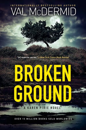 This cover image released by Atlantic Monthly Press shows "Broken Ground," a novel by Val Mcdermid. (Atlantic Monthly Press via AP)