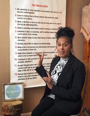 Stephanie Tobey-Roderick talks in her Mashpee home about her struggle with addiction and work as a drug and alcohol counselor. In 2016, there were 11 opioid-related deaths among the roughly 3,000-member Mashpee Wampanoag Tribe, of which Tobey-Roderick is a member, prompting officials to declare a state of emergency. [Ron Schloerb/Cape Cod Times]