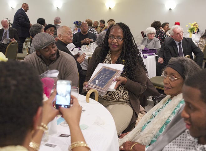 Wanda Jones, behavior support specialist at Pell Elementary School in Newport, received the Education Award at the NAACP Newport Chapter awards dinner on Saturday. [PETER SILVIA PHOTO]