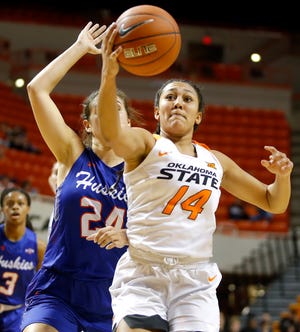 Midway through her sophomore season, Oklahoma State's Braxtin Miller (14) is seven 3-pointers away from 100 for her career, a mark only 10 other Cowgirls have ever reached. [PHOTO BY BRYAN TERRY, THE OKLAHOMAN]