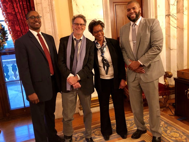 Left to right are Roger Williams University Law School grads Christopher Knox Smith, Dean Michael Yelnosky, Melissa R. DuBose, and Keith A. Cardoza Jr. [COURTESY OF ROGER WILLIAMS UNIVERSITY]