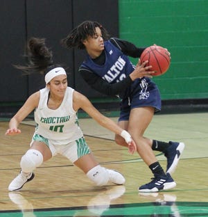 Walton's Haleigh Graham keeps the ball away from a Choctaw defender earlier this season. [MICHAEL SNYDER/DAILY NEWS]