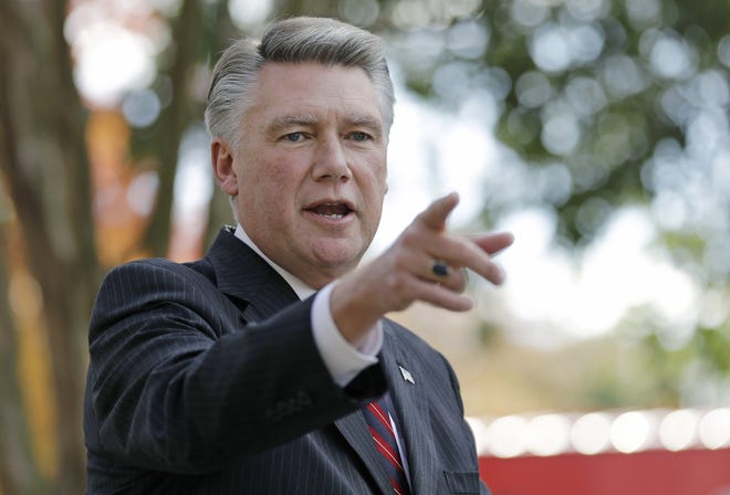 The race involving Republican Congressional candidate Mark Harris is awash in doubt as North Carolina election investigators concentrate on a rural county where absentee-ballot fraud allegations are so flagrant they've put the Election Day result into question. [AP Photo/Chuck Burton, File]