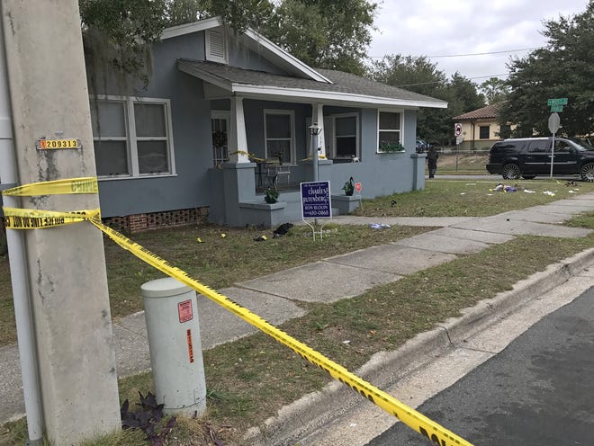 Clothing and other evidence was found Monday morning in a yard at 1700 W. Main St. in Leesburg after a man was fatally shot. [Frank Stanfield/Daily Commercial]