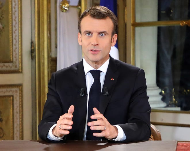 Facing exceptional protests, French President Emmanuel Macron is promising to speed up tax relief for struggling workers and to scrap a tax hike for retirees. [Ludovic Marin/AP Photo]