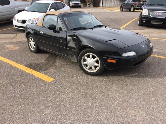 A Mazda Miata belonging to State Rep.-elect Paul Waggoner, R-Hutchinson, was accidentally hit in the Hutchinson Community College parking lot Tuesday, while Waggoner was participating in a legislative forum. [MARY CLARKIN/HUTCHNEWS]