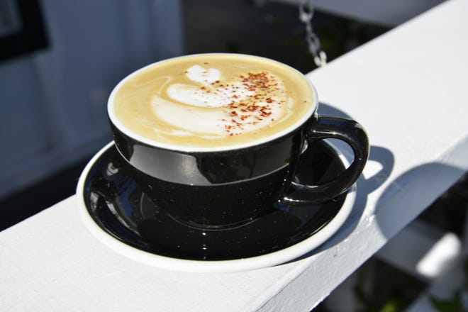 The Campfire Latte uses house-made anise and cinnamon simple syrup with Aleppo-style pepper on top. The recipe came from Stumptown Coffee Roasters, which provides coffee for Black Bear Bread Co. in Grayton Beach. [SAVANNAH VASQUEZ/DAILY NEWS]