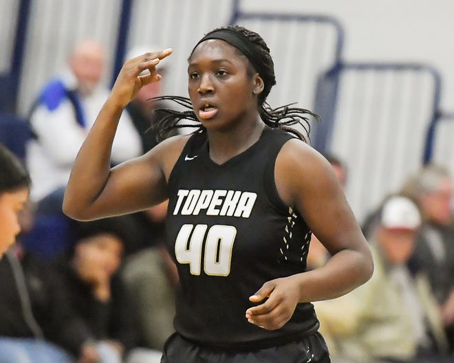 Topeka High's NiJaree Canady reacts to a 3-pointer against Hayden on Tuesday night. [Rex Wolf/Special to The Capital-Journal]