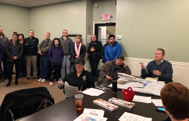 Residents opposed to a dog park on Hayden Rowe Street showed up in force at a meeting of the Hopkinton Parks and Recreation Commission on Monday night. [Daily News Photo/Jonathan Phelps]