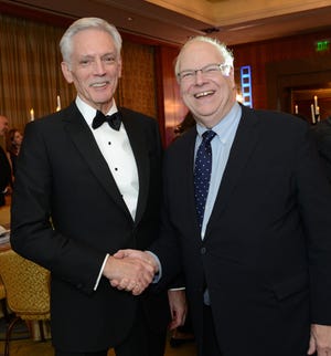 Thomas A. Croswell, president and CEO of Tufts Health Plan in Watertown, was honored at the Heroes in Health Care Gala. Pictured, from left: Croswell and James Roosevelt Jr., a past Heroes honoree. [Courtesy Photo / Roger Farrington]