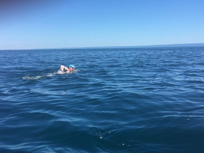 Rob Cooney, 39, of McKean, swam across Lake Erie this summer.