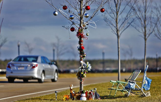 A roadside memorial on the Delahunt Parkway in South Weymouth decorated for the holidays on Monday , Dec .10, 2018 Greg Derr/ The Patriot Ledger