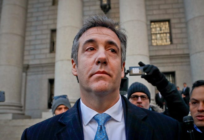 In this Nov. 29, 2018, file photo, Michael Cohen walks out of federal court in New York. The moment of reckoning has nearly arrived for Cohen, who finds out Wednesday, Dec. 12, whether his decision to walk away from President Donald Trump after years of unwavering loyalty will spare him from a harsh prison sentence. (AP Photo/Julie Jacobson, File)