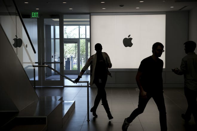 Workers move through the halls of Apple's current campus on West Parmer Lane in Austin in this photo from Aug. 24, 2016. Apple on Wednesday announced plans to expand its Austin presence with a new 133-acre, $1 billion campus that will be home to 5,000 workers and could eventually grow to house 15,000.  [JAY JANNER / AMERICAN-STATESMAN]