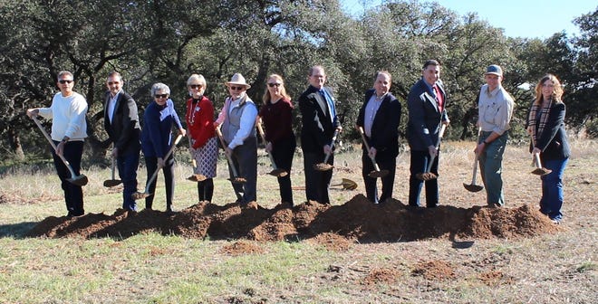 Williamson County elected officials and staff turn dirt for the first phase of development at River Ranch County Park. The sprawling parkland is located southwest of Liberty Hill. [Courtesy photo]