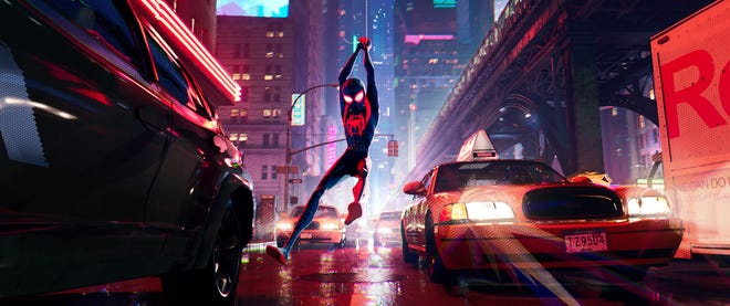 Miles Morales (voice of Shameik Moore) is the Spider-Man in his universe as his and other dimensions cross paths in "Spider-Man: Into the Spider-Verse." [Sony Pictures]