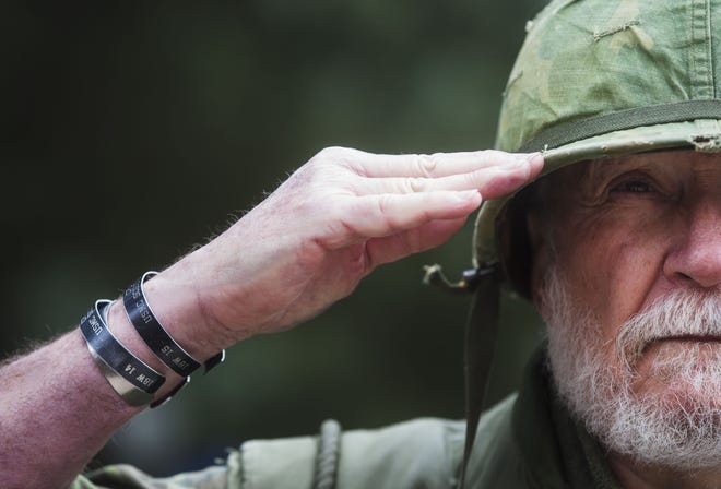 Don Dorsey, a Marine sniper in the Vietnam War, salutes while attending the Memorial Ceremony at the Texas State Capitol in honor of Veterans Day on Nov. 11. [AMANDA VOISARD/AMERICAN-STATESMAN]