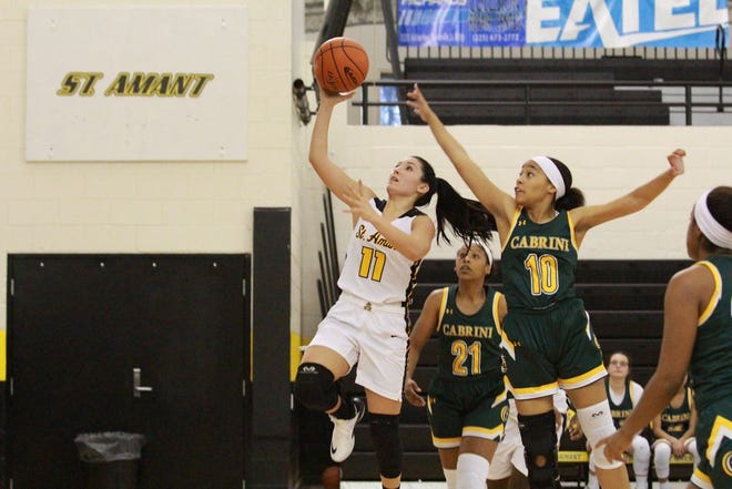 St. Amant's Kelsi Martine scored nine in the Lady Gators' one-point victory over Cabrini. Photo by Kyle Riviere.