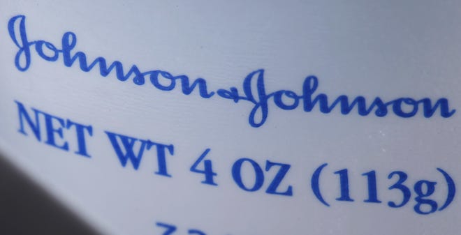 Johnson & Johnson is forcefully denying a media report that it knew for decades of the existence of trace amounts of asbestos in its baby powder. The report on Friday, Dec. 14, by the Reuters news service sent company shares into a tailspin, suffering their worst sell-off in 16 years. [THE ASSOCIATED PRESS]