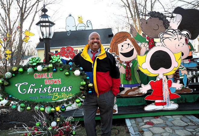 Al Bailey presents his holiday display, "A Charlie Brown Christmas," on the front lawn of his home at 487 Ocean Road, near the intersection of Banfield Road in Portsmouth. The Baileys, formerly of Agamenticas Estates in South Berwick, Maine, created well-remembered holiday displays around their front yard for 14 years before moving to Portsmouth. [Rich Beauchense/Seacoastonline]
