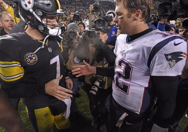 Pittsburgh Steelers quarterback Ben Roethlisberger (7) and New England Patriots quarterback Tom Brady (12) meet following last year's NFL game at Heinz Field in Pittsburgh. The two teams meet again in Pittsburgh on Sunday, kickoff is set for 4:25 p.m. [AP photo]