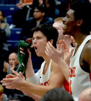 Hope’s Jake Honer (left) and Dennis Towns react during a game against Wisconsin-Platteville on Saturday at DeVos Fieldhouse. [Dan D’Addona/Sentinel staff]