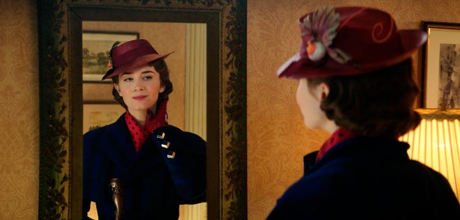 This image released by Disney shows Emily Blunt as Mary Poppins in "Mary Poppins Returns." On Thursday, Dec. 6, 2018, Blunt was nominated for a Golden Globe award for lead actress in a motion picture comedy or musical for her role in the film. The 76th Golden Globe Awards will be held on Sunday, Jan. 6. (Disney via AP)