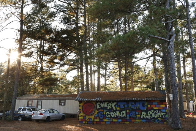 A mural painted by park landlord Richard Miller at the The Glenn Park Community trailer park in Athens, Ga., on Wednesday, Dec 5, 2018. “The stigmas of trailer parks is ... it´s really ghetto or it´s really white trash, and after living here before I took it over I found out that´s not true. The majority of the people here are really good hearted. They want to live a good life," said Miller. [Photo/Joshua L. Jones, Athens Banner-Herald]