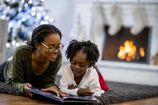 According to a 20-year study, having a rich home library can propel a child a little more than three years further in education. [iStock]