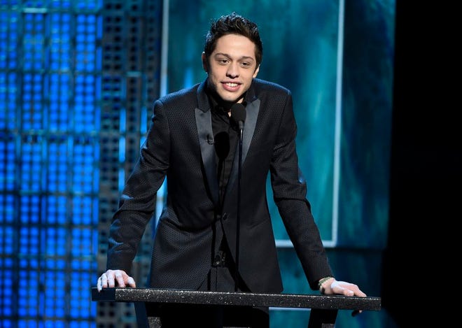 n this 2015,file photo, Pete Davidson speaks at a Comedy Central Roast at Sony Pictures Studios in Culver City, Calif. New York police were concerned about Davidson after he wrote "I don't want to be on this earth anymore" on Instagram. And they visited the "Saturday Night Live" star Saturday, Dec. 15, 2018, to make sure he was OK.
